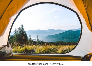 view from the tent in the morning in the mountains during the foot on the Ukrainian Carpathians
