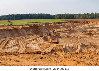 View of the territory of the sand pit development and working equipment - Shutterstock ID 2334903313