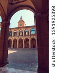 The view through the arch on palace of Archiginnasio in Bologna, Italy from the inner courtyard. Municipal Library and the famous Anatomical Theater.