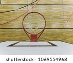 View from up through  basketball hoop, school sporting wooden board at the bottom  with a black line and kind of reflections. Basketball hoop in the sports hall closeup