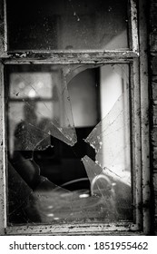 A View Through A Broken Window In A Derelict Building, Portrait Orientation - Shutterstock ID 1851955462