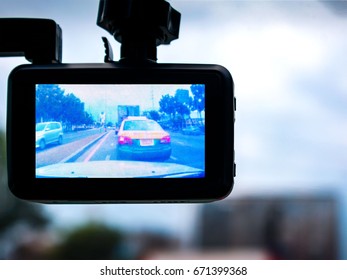 A View Through A Dashcam In Traffic