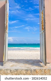 View Through A Door Of A Beautiful Tropical Beach