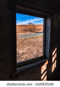 View Through the Window of an Abandoned barn