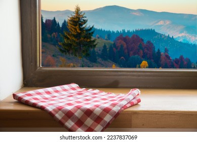 View through the window of a cottage into a snow-covered winter forest. High quality photo - Shutterstock ID 2237837069