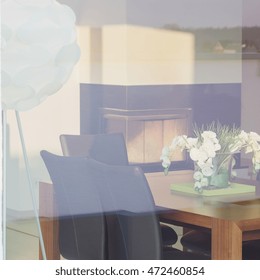 View through the window of cozy dining space