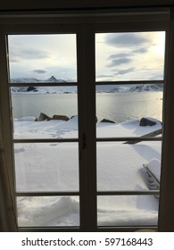 A view through a window in winter time.