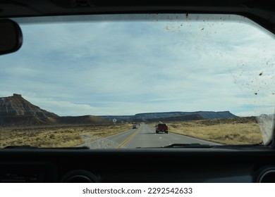 view through windscreen of a SUV on Highway 89 in Utah, United States of America