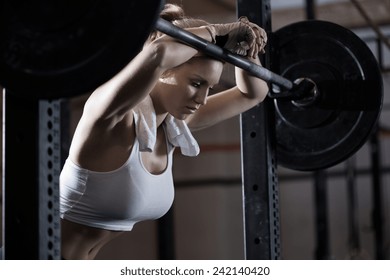 View Of Tired Girl After Weight Lifting