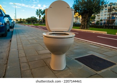View of toilet in the middle of Malaga street in Spain - Shutterstock ID 2207144461