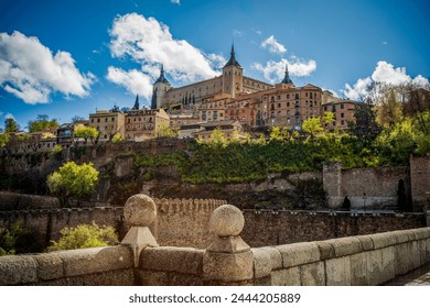 View of Toledo, Castila la Mancha, Spain, world heritage city with the Alcazar high above on a bright day - Powered by Shutterstock