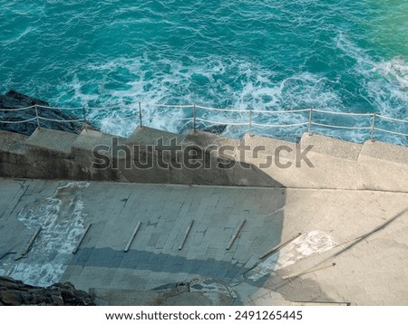 Similar – Image, Stock Photo Manarola is one of the most beautiful villages in Italy. The Cinque Terre is a rugged coastline of the Ligurian Riviera and is made up of five beautiful hilltop villages.