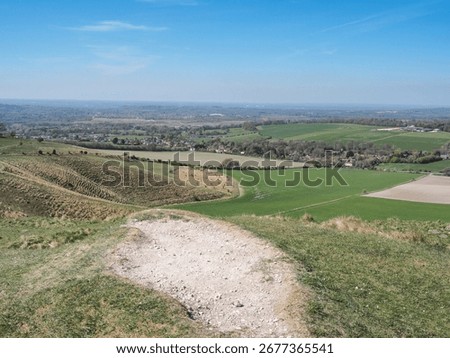 View from the top of Cherwill Down over the village of Cherwill and the Wiltshire plain, UK