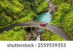 A view from top to the Maui waterfalls and one of the famous bridges which is the road to Hana