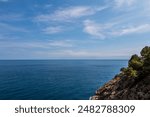 View from the top of the Mediterranean Sea and the rocky coast of the city of Tossa de Mar, Costa Brava, Catalonia. Spain. Beautiful seascape