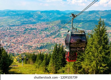 View from the top of the mountain on the city of Sarajevo and funiculars rising up to the highest point of the city. Sarajevo, Bosnia and Herzegovina