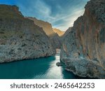 A view of the Torrent de Pareis Gorge and beach on the rugged mountain coast of northern Mallorca