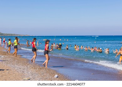 View Of Tourists Exercising In Water With Group Of Hotel Sport Instructors. Rhodes. Greece. 07.15.2022. 