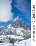 A view toward the town of corvara and gondola at the alta badia ski resort with sassongher mountain behind, dolomites, south tyrol, italy, europe