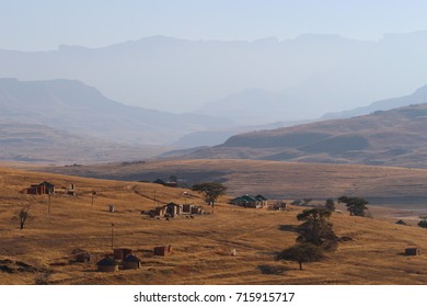 View Towards The Drakensberg Mountains With The Rural Landscape Of Kwa Zulu Natal During The Dry Winter Time