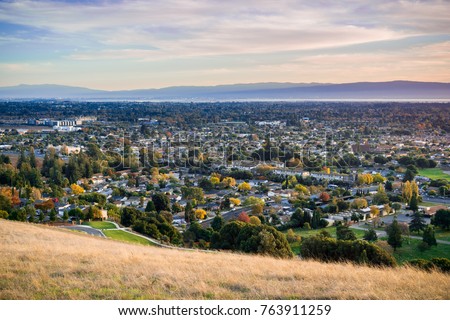 View towards Fremont and Union City from Garin Dry Creek Pioneer Regional Park on a sunny autumn evening, San Francisco bay, California