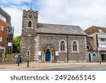 A view towards Saint Pancras church in the center of Chichester, Sussex in summertime