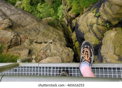 View from the tower down on the stairs and shoes