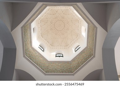 A view of a traditional Algerian ceiling dome with intricate designs, highlighting cultural and architectural details - Powered by Shutterstock