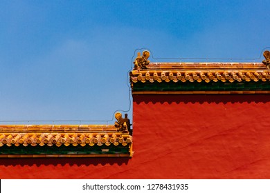 View Of Traditional Chinese Architecture With Red Wall And Yellow Roof Tiles, In Forbidden City, Under Blue Sky, In Beijing, China