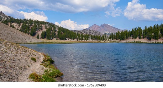 View Of The Trail Around Moraine Lake With Broken Top Mountain At The Background In Central Oregon.