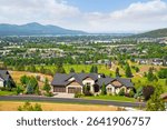 View of the Trailhead Golf Course, Mt Spokane and the state of Idaho from a high end subdivision in the suburban city of Liberty Lake, near Spokane Washington.