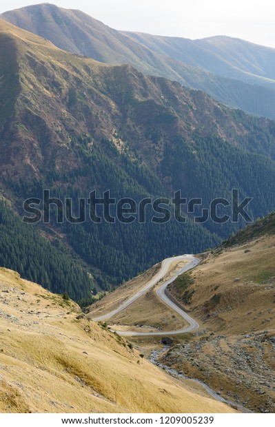 View to Transfagarasan road. It is a paved mountain\
road crossing the southern section of the Carpathian Mountains of\
Romania. It has national-road ranking and is the second-highest\
paved road in the