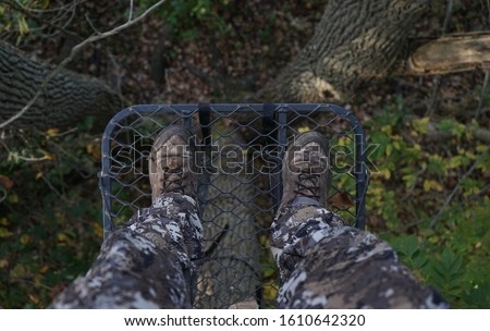 The view from a tree stand through the eyes of a bow hunter.