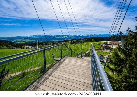 View of the tree top path and trail in beautiful mountain scenery - Skywalk in Alps - Travel destination in Scheidegg, Bavaria, Germany -