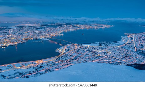 View of Tromso (Norway) photographed from up the Fjellheisen cable car station in January 2019