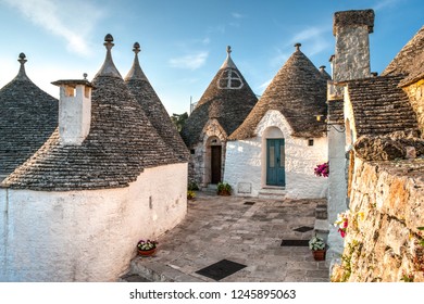 View of Trulli houses in Alberobello, Italy - Shutterstock ID 1245895063