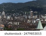 A view of Turin city center from Faà di Bruno bell tower. In the background Littoria tower and Mole Antonelliana symbol of the city