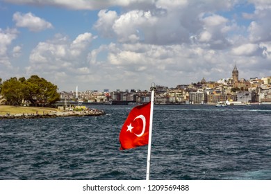 View of the Turkish Flag and Galata Tower, Galata Bridge, Karakoy district and Golden Horn