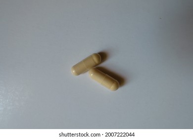 View Of Two Beige Capsules Of Milk Thistle Extract From Above