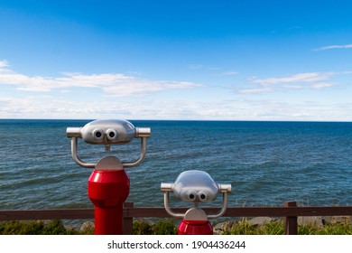 View of two tower viewers looking towards the estuary of the Saint Lawrence river, in Rimouski, Canada