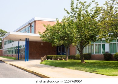 View of typical American school building exterior  - Shutterstock ID 1157769064