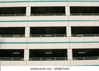 View Of Typical Multi Level Parking Garage Facade And Exterior.