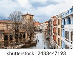 View of a typical street in Aviles, San Francisco and the church of San Nicolas de Bari. Winter
