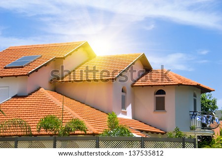 A view of typical vintage house with tile roof