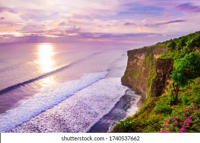 View of Uluwatu cliff with pavilion and blue sea in Bali, Indone