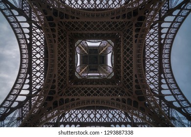 A view from under the Eiffel Tower looking up, in Paris, France