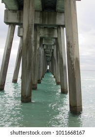 View under a pier at the ocean in Florida