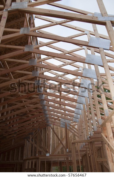 View Unfinished Vaulted Roof Trusses Sheeted Stock Photo