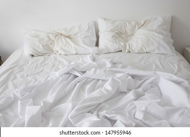 View Of An Unmade Bed