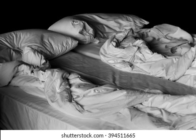 View Of An Unmade Bed